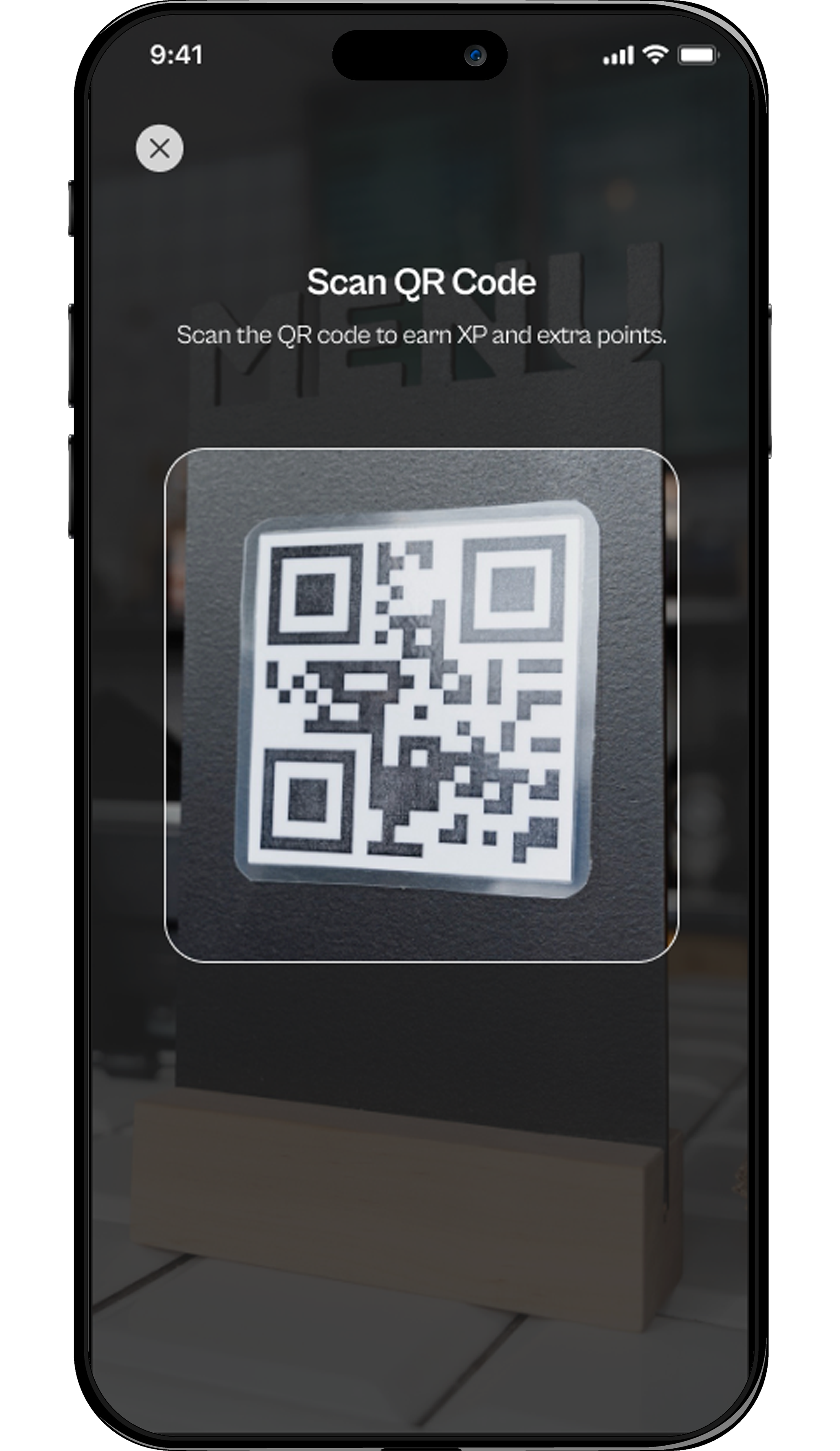 A phone scanning a qr code